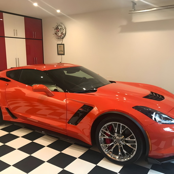 Modern garage with red sports car and cabinets - Ed from Summerville, SC
