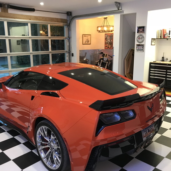Modern garage with Corvette, tool chest, and checkered floor - Ed from Summerville, SC