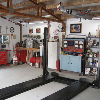 Organized garage with car lift and tool storage - Rick from Emmett, ID