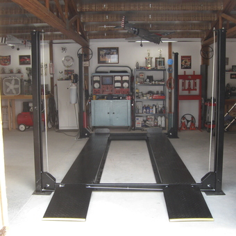 Organized garage with four post car lift and tools - Rick from Emmett, ID
