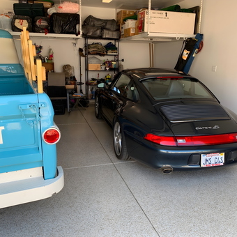 Organized garage with classic cars and storage shelves - Joe from San Luis Obispo, CA