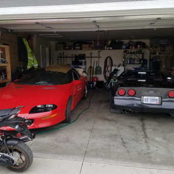 Two Sports Cars and Tools in Organized Garage - frosty from Brookings, SD