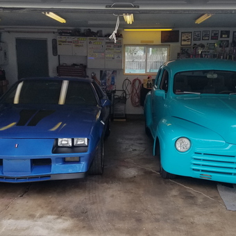 Classic Blue Muscle Car and Teal Truck in Organized Garage - Ty from Hoopesston, IL