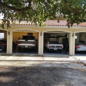 Four-car garage with sports cars and truck - Ken from Tampa, FL