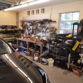 Organized garage with workbench, storage racks, and tools - Ken from Tampa, FL