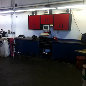 Garage with Red Wall Cabinets and Workbench - Butler from Ashland, OR