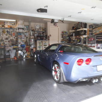 Organized garage with Corvette, wall art, and tool storage - Jim from SAINT HELENS, OR