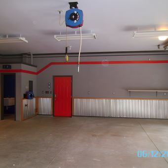 Garage with Corrugated Metal Walls and Hose Reels - Michael from Bowling Green, KY