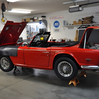Classic car on jack stands in organized garage - Bruce from Roanoke, IN