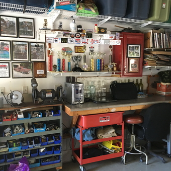Organized garage workspace with tool storage and red cart - Moon from Wilmington, NC