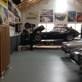Classic Jaguar Garage with Car Lift and Wall Art - John from Villa Ridge, MO