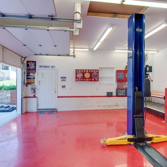 Organized garage with car lift and wall tire rack - Gary from Goodlettsville, TN