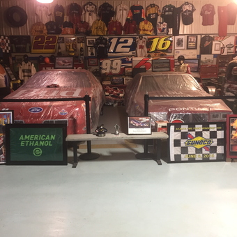 Racing Memorabilia Display With NASCAR Cars And Signs - David from Great Barrington, MA