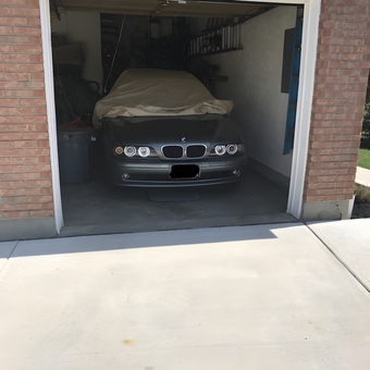 Organized garage with car cover and wall storage - Paul from Mason, OH