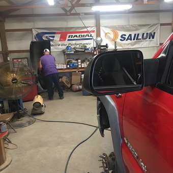 Organized garage with workbench, tools, and truck - Buck's Boy from Beaver Dam, KY