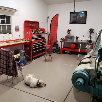 Organized garage workspace with tool chests and classic car - Grandpa from Stockton, CA