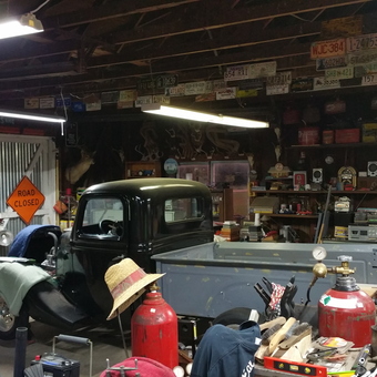 Classic truck, vintage signs, and tools in garage - Dave from Sallisaw, OK