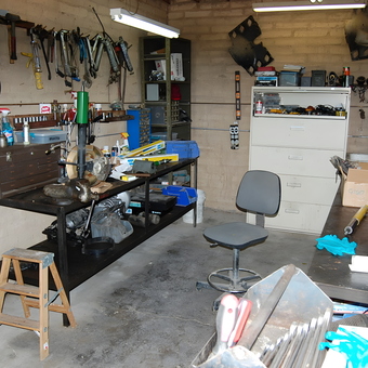 Organized garage workshop with tool storage and workbenches - Fritz from Tucson, AZ
