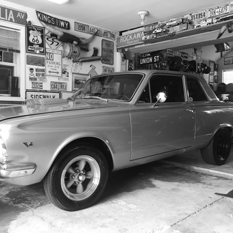 Classic Car in Vintage Garage with Signs - Mouse from Brooklyn, NY