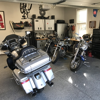 Organized motorcycle garage with cabinets and tool chests - Keith from Simpsonville, SC