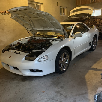 White sports car in garage with open hood - Austin from Moscow, PA