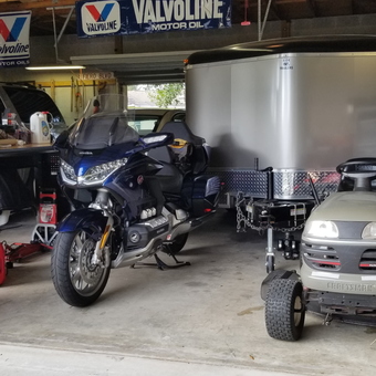 Organized garage with motorcycle, trailer, and mower - CoolBlue87GT from PORT CHARLOTTE, FL
