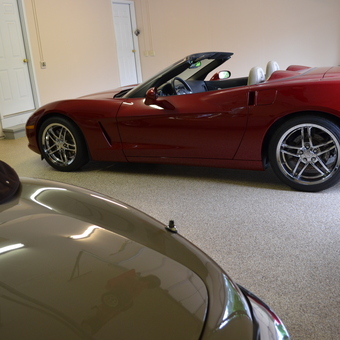 Clean garage with red convertible and storage cabinets - Jim from Weldon Spring, MO