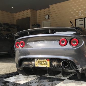 Lotus sports car in organized garage with wall storage - David from Leawood, KS