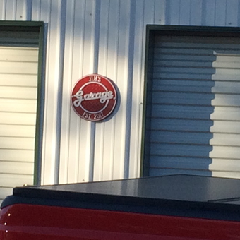 Personalized Garage Sign on Metal Building Exterior - Jim