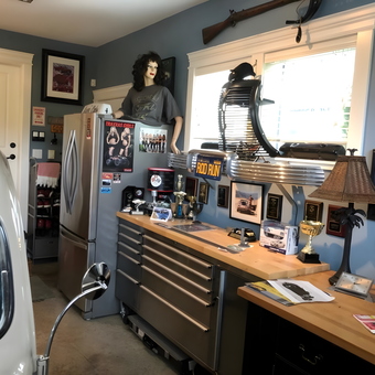 Organized Garage with Tool Chests, Car Decor, and Trophies - Gerry