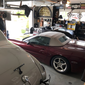 Classic Cars, Garage Decor, and Tools Displayed - Gerry