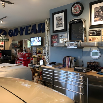 Classic Garage Decor with Wall Signs and Tool Cabinets - Gerry