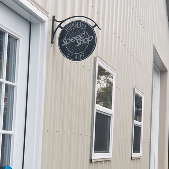 Custom metal speed shop sign on garage exterior - Eric from Trenton, OH