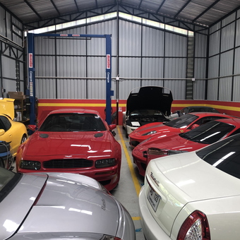 Exotic Sports Cars in Modern Garage with Car Lift - Phan from Bangkok