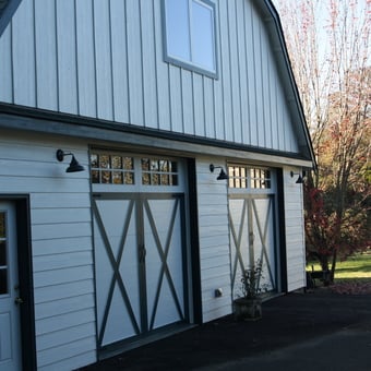 White barn-style garage with carriage doors and lighting - Terry from Albany, OR