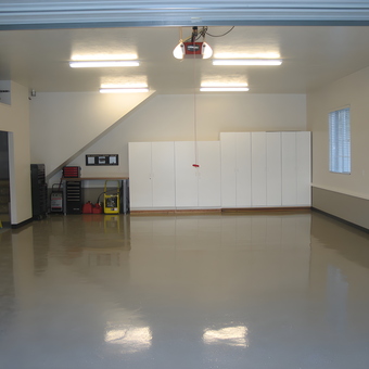 Clean epoxy garage floor with cabinets and tool chests - Kent from Ogden, UT