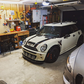 Organized garage with workbench, pegboard, and Mini Cooper - Justin from Springfield, GA