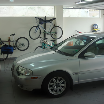 Organized Garage with Bike Racks and Silver Car - John from Quito, Ecuador