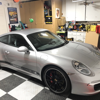 Organized garage with Porsche, cabinets, and wall decor - PorscheRB from Campbell, CA