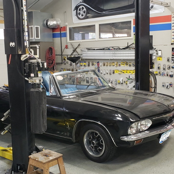 Classic car on two post lift with organized garage wall - Jim from Hopewell Junction, NY