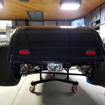 Classic Car Rear on Dollies in Organized Garage - Sky from CHANDLER, AZ