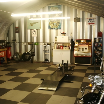Checkered Floor Garage with Motorcycle Lift and Decor - Curtis from Grady, AL