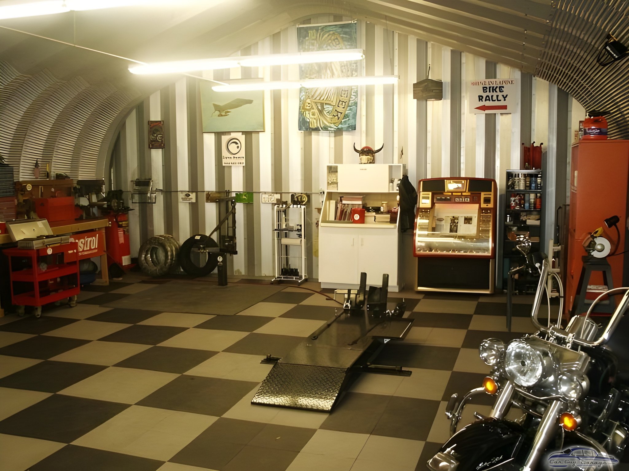Checkered Floor Garage with Motorcycle Lift and Decor - Curtis from Grady, AL
