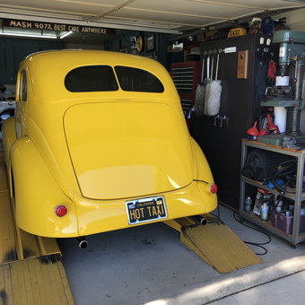 Classic Yellow Car in Organized Garage - HOTTAXI from Ventura, CA