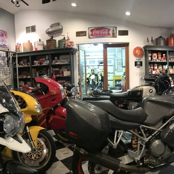 Motorcycle garage with vintage signs and collectibles - Nicholas from Salt Lake City, UT