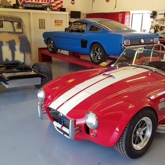 Classic Car Garage With Lift, Tools, and Red Cobra - ci-19398