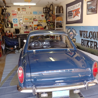 Classic Sunbeam Car in Decorated Garage with Biker Signs - ci-19406