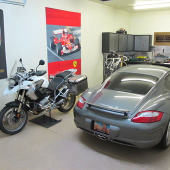 Organized garage with Porsche, BMW motorcycle, cabinets - Mark from Henderson, NV