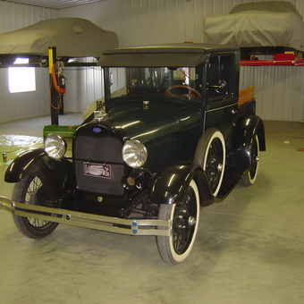 Classic Car Garage with Lifts and Covered Vehicles - Leonard from Ankeny, IA
