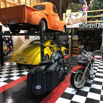 Classic Cars on Lift and Motorcycles in Checkered Garage - Jeff from Owings, MD
